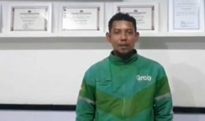 Charly pengemudi ojol (Foto: Beritasatu Photo: Vento Saudale)